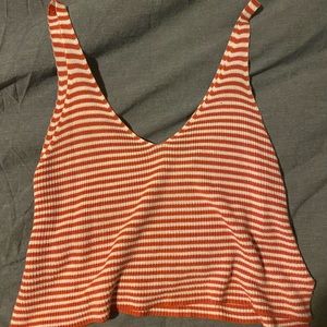 Cropped orange and white striped cropped tank top